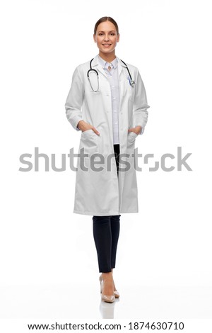 medicine, profession and healthcare concept - happy smiling female doctor in white coat with stethoscope Royalty-Free Stock Photo #1874630710