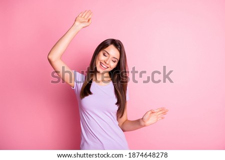 Photo portrait of beautiful female student dancing at party with closed eyes isolated on pastel pink color background