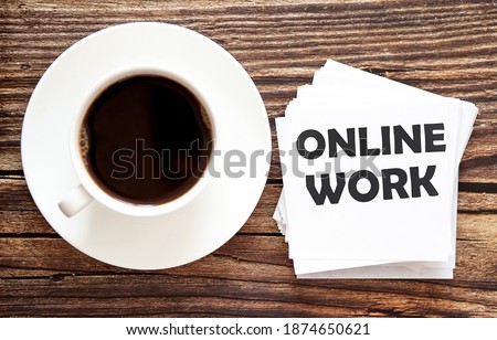 Word writing text ONLINE WORK . Business concept for Urgent Move.Text in white stickers with a cap of coffee
