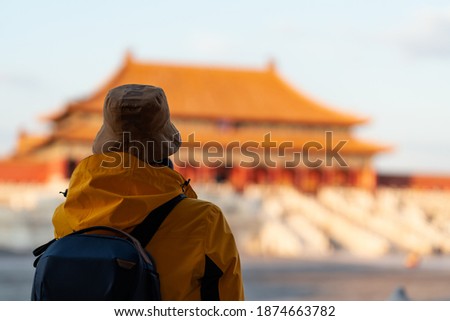 Traveling in the Forbidden City of Beijing in autumn