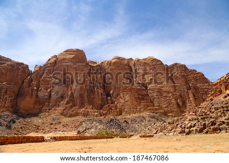 Mountains of Wadi Rum Desert also known as The Valley of the Moon is a valley cut into the sandstone and granite rock in southern Jordan 60 km to the east of Aqaba