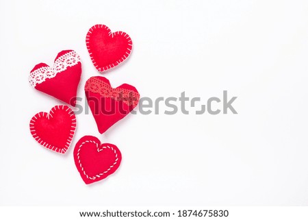 Red textile hearts on white background. Valentine's Day concept. Top view, copy space - Image