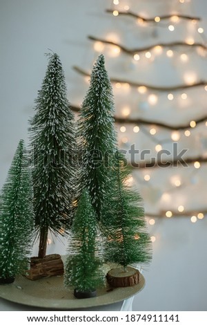 Christmas fir tree, bright decorations. Home atmosphere. Cozy Christmas concept. Selective focus