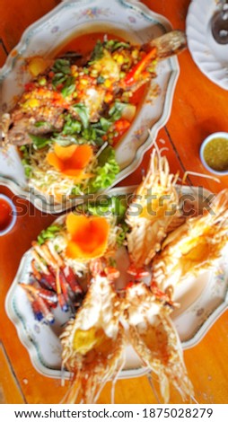 Blur picture background of seafood at local restaurant in Bangkok,  Thailand,  Asia. 