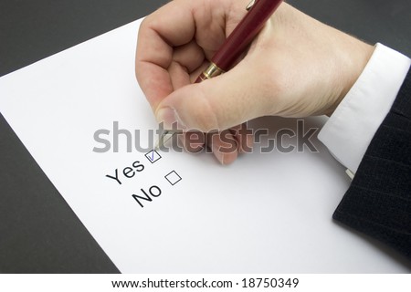 Hand with pen and check boxes isolated on white background