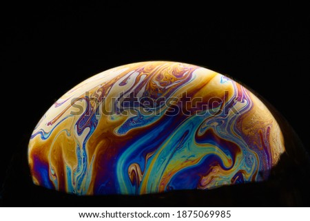 Soap bubble abstract on a black background