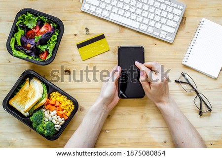 Food delivery online with mobile phone. Restaurant ordering