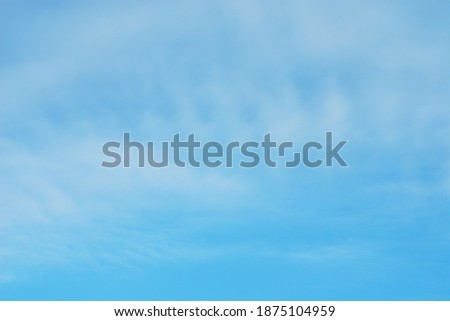 Cloudy day in blue sky background. Soft light blue color of pastel tone sky and clouds.