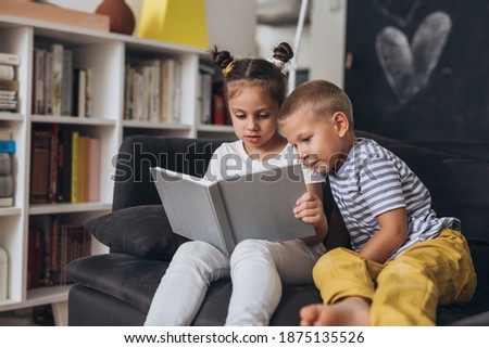 kids playing in living room at home