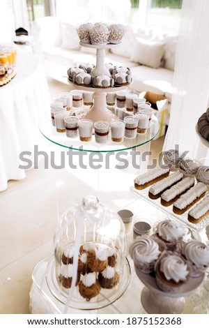 Candy bar with balls, macaroon on candy bar, candy bar on holiday, candy bar at the wedding