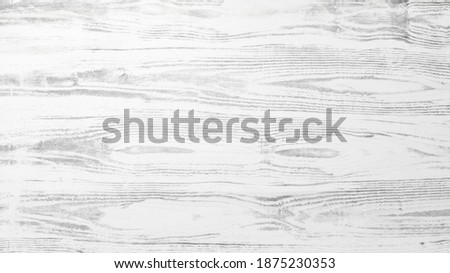 Textured white wooden background. Top view. Free copy space.