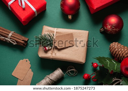 Christmas gift box, wrapped, with brown tag label, greeting card