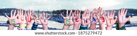 Children Hands Building Word Glueck Gehabt Means Lucky, Snowy Winter Background