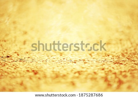 Golden festive background with glitter