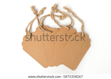 
Cardboard labels with ropes isolated on white background