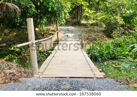 bamboo bridge in countryside . 