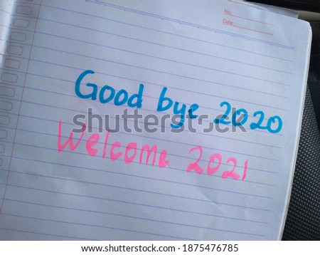 Handwriting text good bye 2020 welcome 2021 in paper book design. Celebrate
Happy new year concept idea