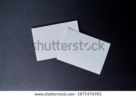 A studio photo of business cards