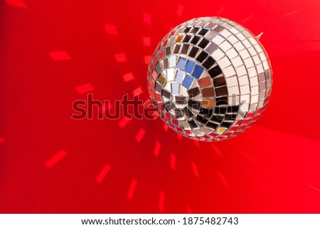 Retro mirror disco ball sun glare reflection copy space. Disco night life party dance 70s 80s concept. festive new year christmas xmas. abstract red minimal background, banner, frame, card