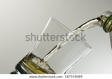 Glass with liquid.