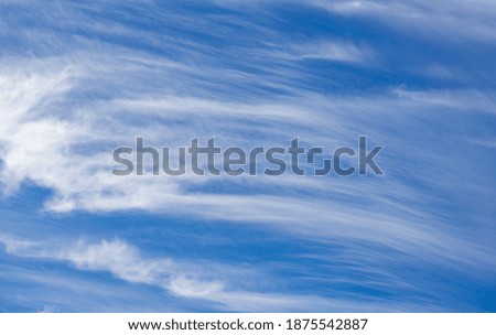 Clouds on a very windy day appear to be racing 2