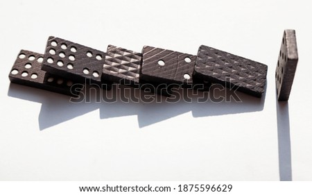 dominoes that have fallen over