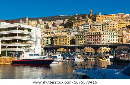 Image of old port of Genova city with boats at quay, Italy