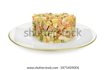 Delicious russian salad Olivier on white background
