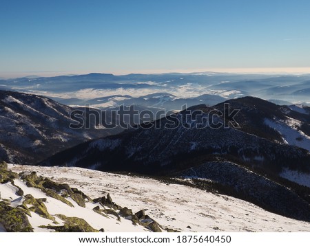 Low Tatras National park in Slovakia, Snow covered mountains on a sunny day