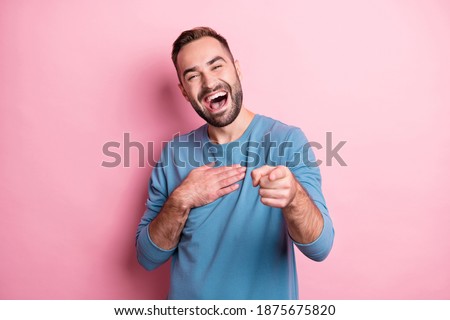 Photo of charming young man dressed blue sweater laughing arm chest pointing finger you isolated pink color background Royalty-Free Stock Photo #1875675820