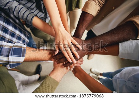 Team spirit is a necessity during any work Royalty-Free Stock Photo #1875779068