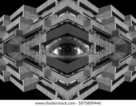 Abstract background in black and white of mirrored concrete apartment buildings with a psychedelic eye in the middle 