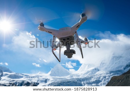 Flying drone taking picture of glacier  in Tibet,China