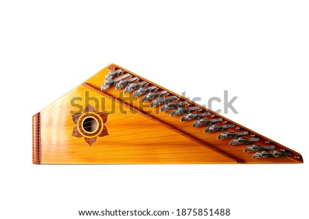 Gusli, East Slavic multi-string plucked instrument, belonging to the zither family. On white background, side view. Isolated.  Royalty-Free Stock Photo #1875851488