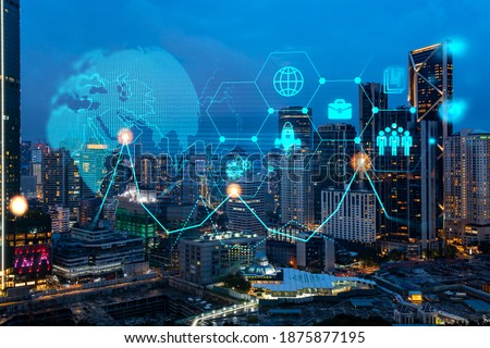 Research and technological development glowing icons. Night panoramic city view of Kuala Lumpur. Concept of innovative activities expanding new services or products in Malaysia, Asia. Double exposure. Royalty-Free Stock Photo #1875877195