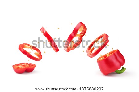 Sweet red pepper sliced and falling isolated on a white background Royalty-Free Stock Photo #1875880297
