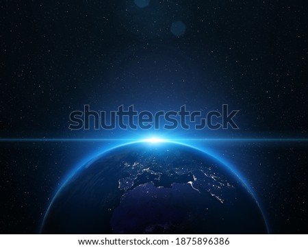 Africa, Europe, and Asia at night viewed from space with city lights. View of Earth from space. Elements of this image furnished by NASA.  Royalty-Free Stock Photo #1875896386