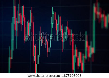 Stock market or forex trading graph and candlestick chart with selective focus. Economy trends for business idea. Profits and Losses.