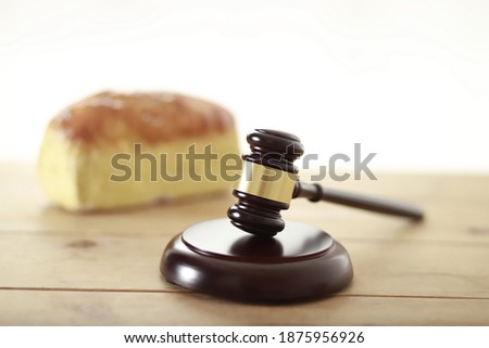 Judge's gavel with bread.Law concept