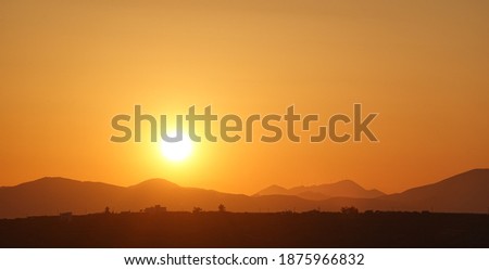 Silhouete of mountains and landscape during sunset