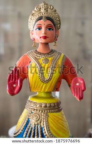 Beautiful Colorful Couple Of Traditional Indian Tanjore Bobble head Roly Poly Dancing Dolls From Thanjavur In Chennai India Widely Used During Navaratri Golu Festival Celebration Royalty-Free Stock Photo #1875976696