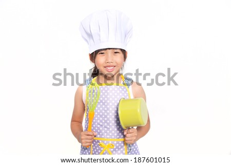 Little asian girl cooking isolate on white background