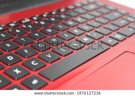 QWERTY Red Keyeboard of laptop closeup