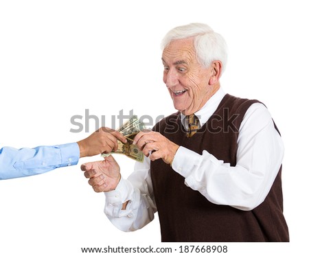 Closeup portrait, super excited, senior, mature man excited to have lots of money, dollar bills handed to him, isolated white background. Positive human emotion facial expression feelings.