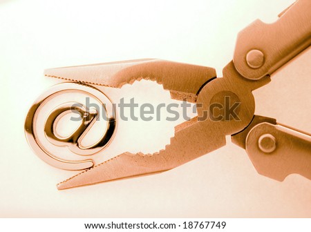 e-mail symbol and pliers