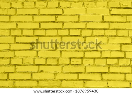 ultimate gray and illuminating yellow color of the year 2021 background brick wall. Trend color brick wall