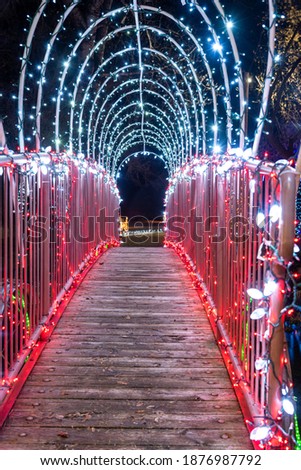 festive footbridge decorated with lights