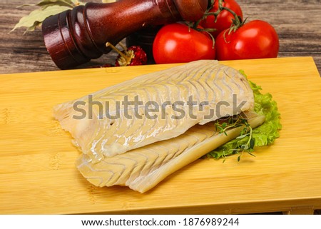 Raw cod fish fillet for cooking