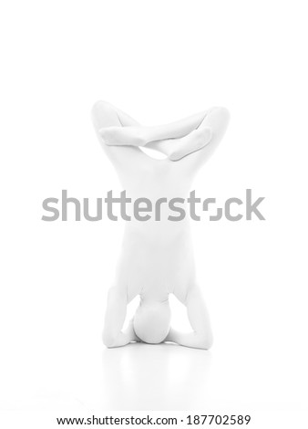unknown faceless man sitting in yoga position on white background sirsasana, legs as the lotus