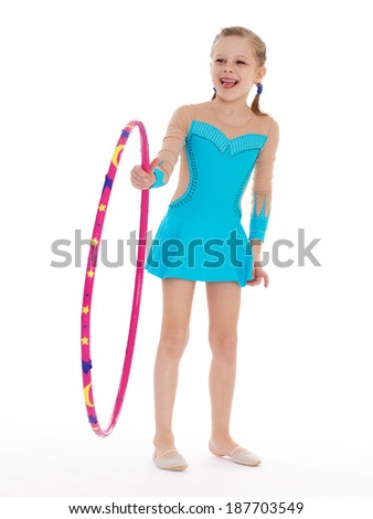 Beautiful little gymnast with the hoop.Isolated on white background.